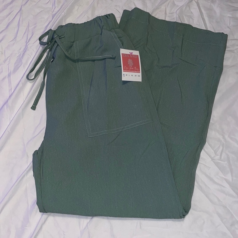 Brand new with tags. Sage green linen wide leg pants. Size small